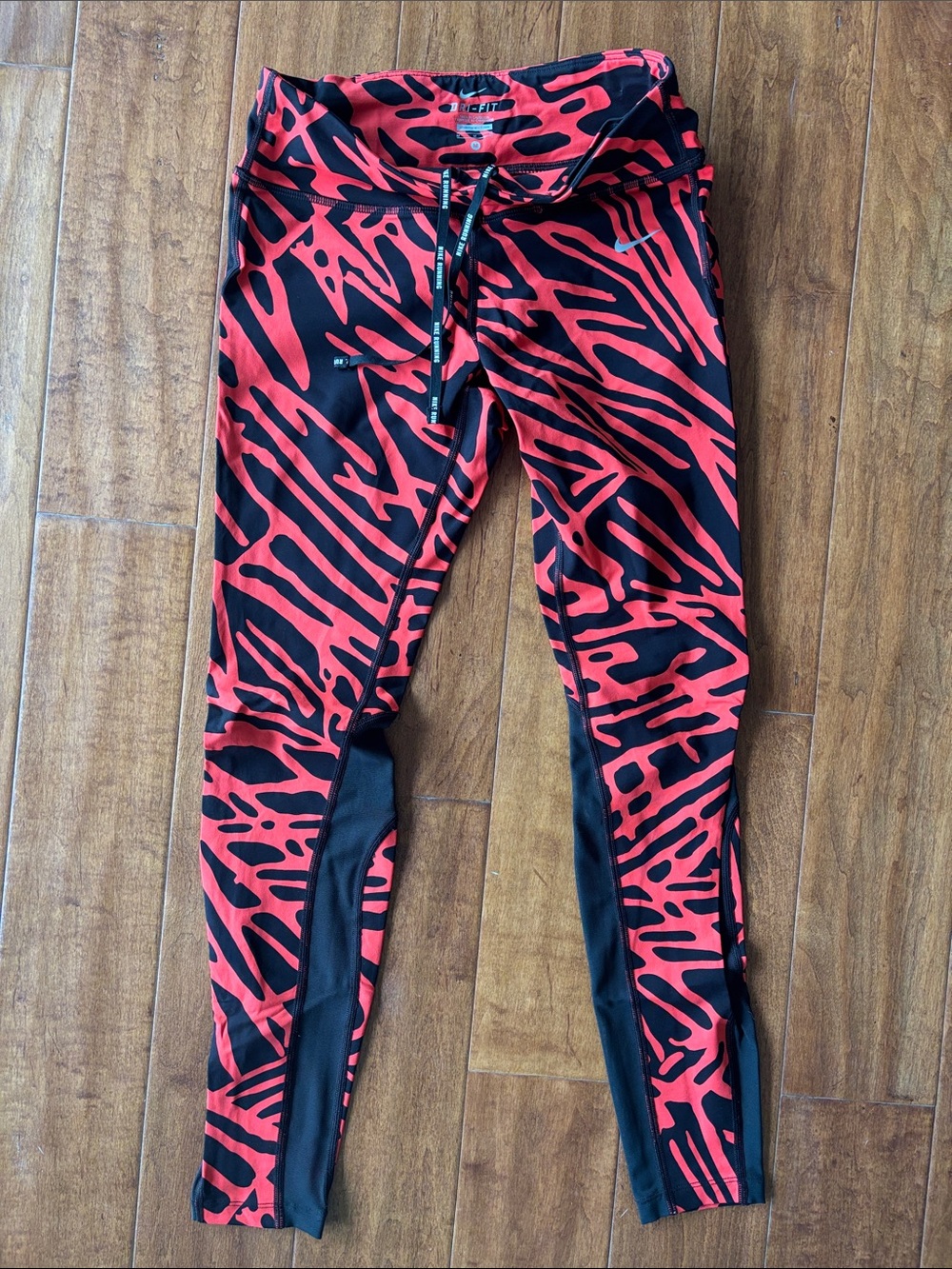 Nike orange and Black Print Performance Leggings